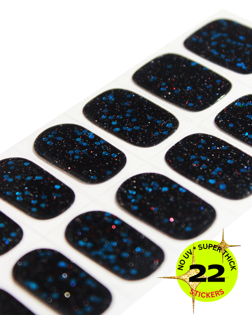 Black glitter nail wrap stickers with blue and red sparkle particles.