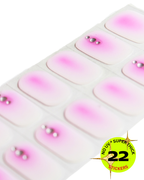 Sheet of pink and white stickers with a silver embellishment, on a white background.