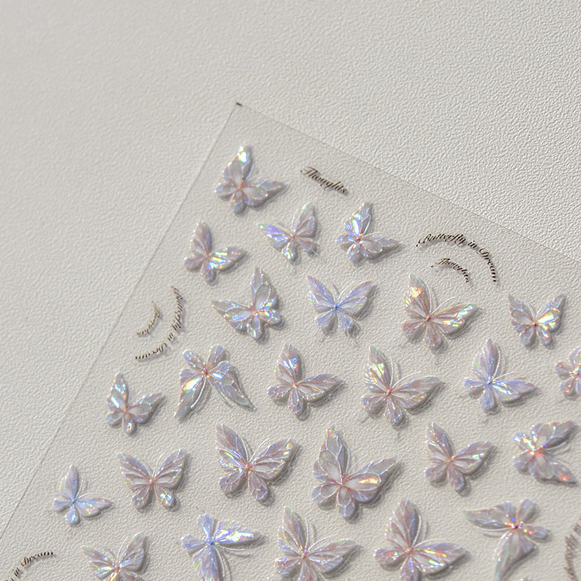 Clear iridescent butterfly nail stickers.
