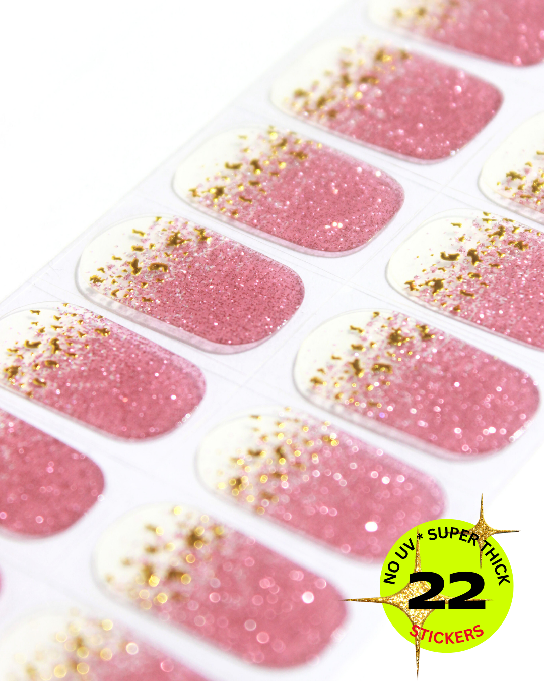 Sheet of pink glitter nail stickers decorated with small gold flakes