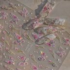 Decorative stickers with pink butterfly designs on a beige background