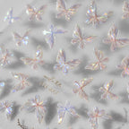 Holographic 3D butterfly nail stickers with crystal-clear wings and pearly finish.