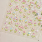 Floral and nature-themed stickers on a beige background