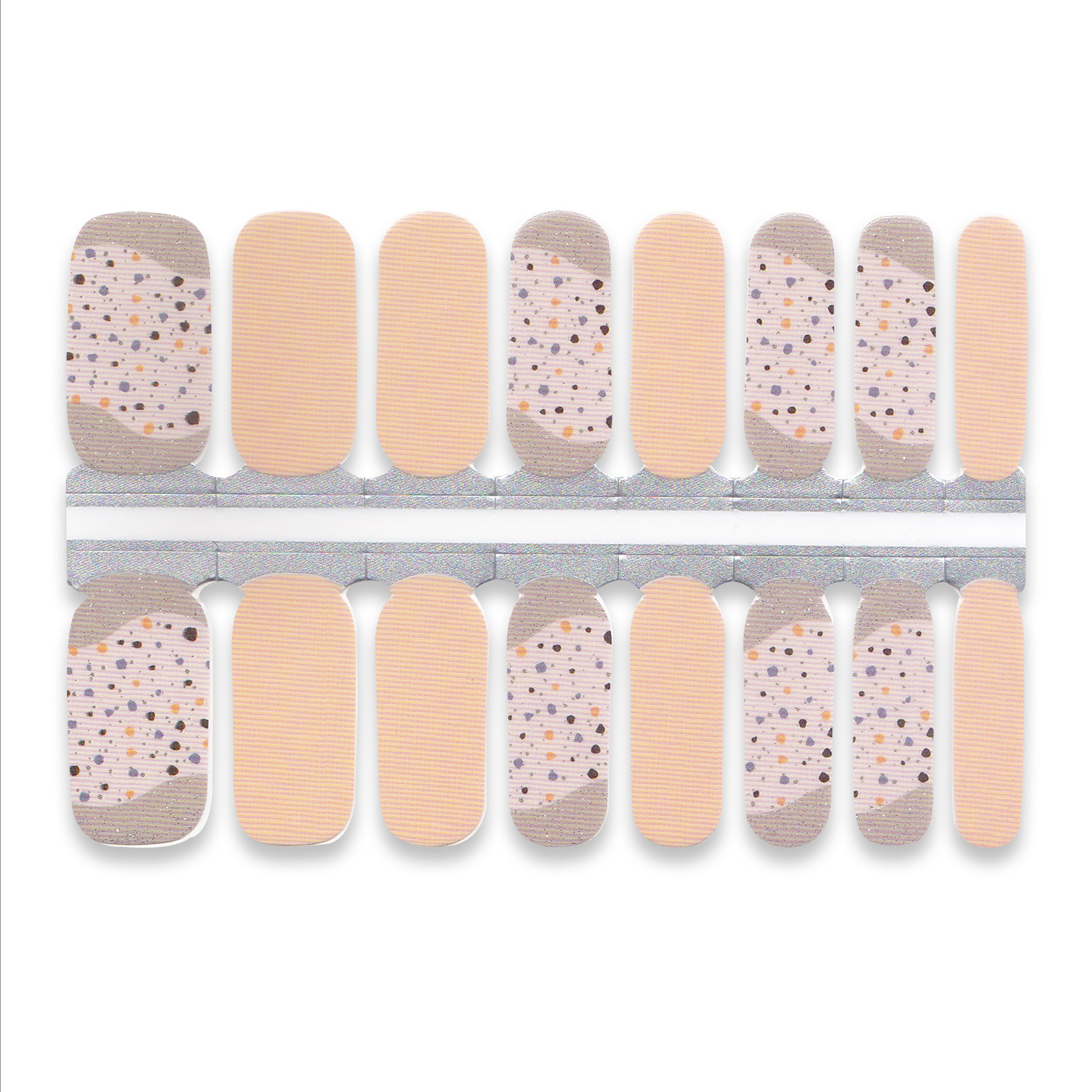 Sheet of nude nail wraps featuring small speckled dots across the surface