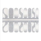 Sheet of clear and silver glitter nail wraps with shimmer gradient pattern