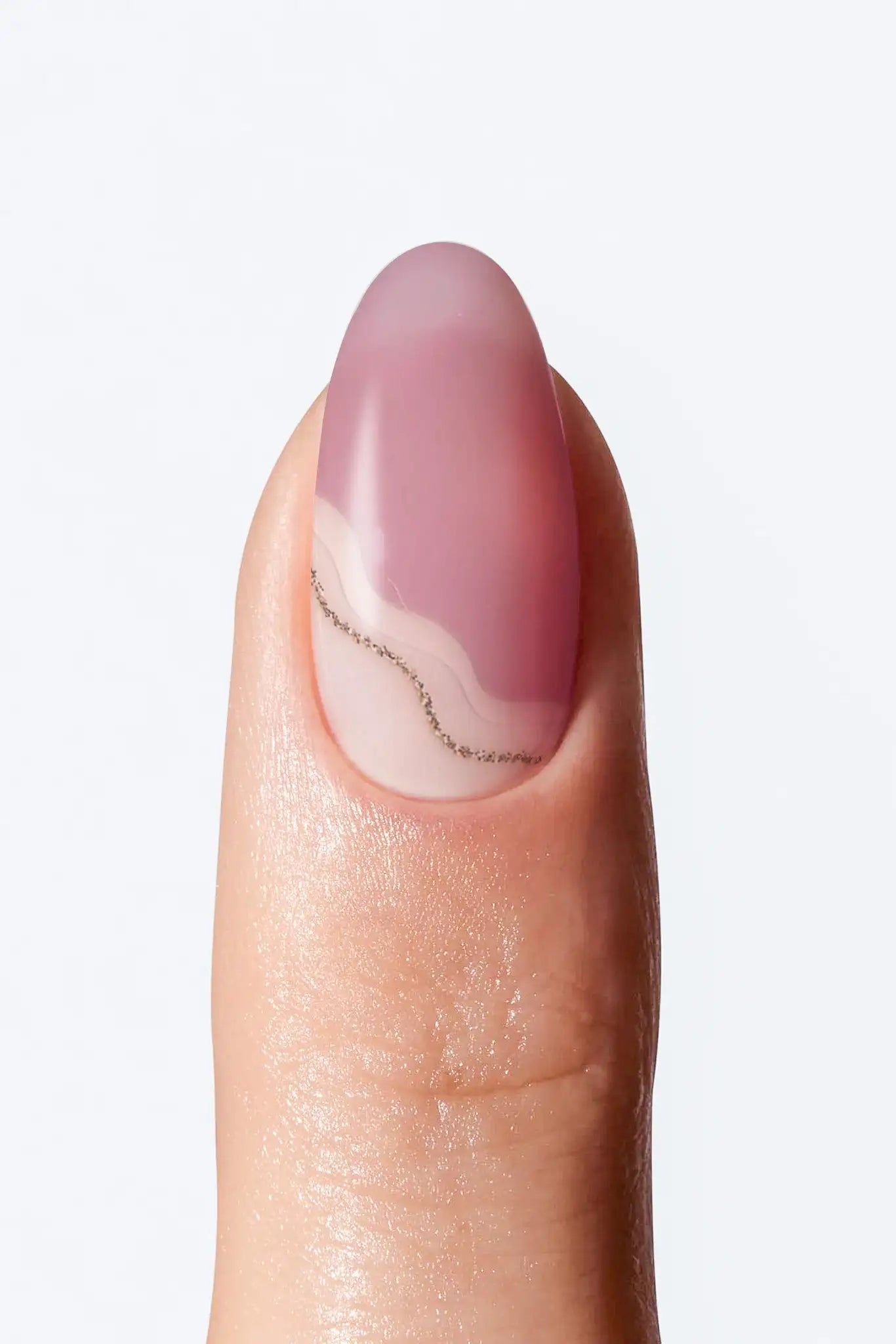 Soft mauve pink  nail wrap manicure with subtle wavy line accent.