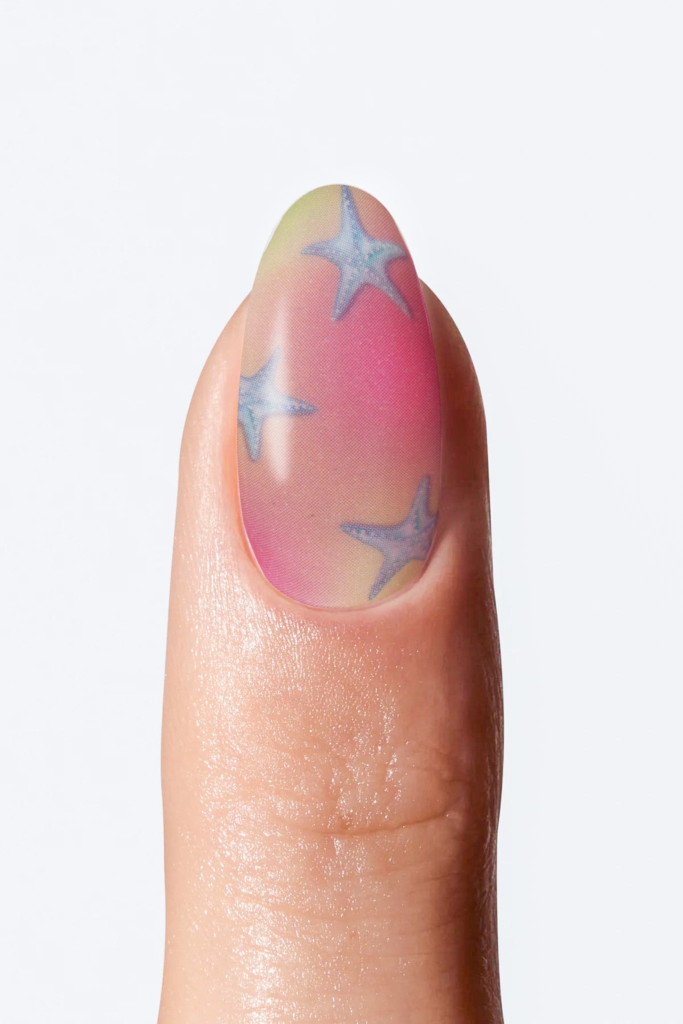Nail with star design on a light background