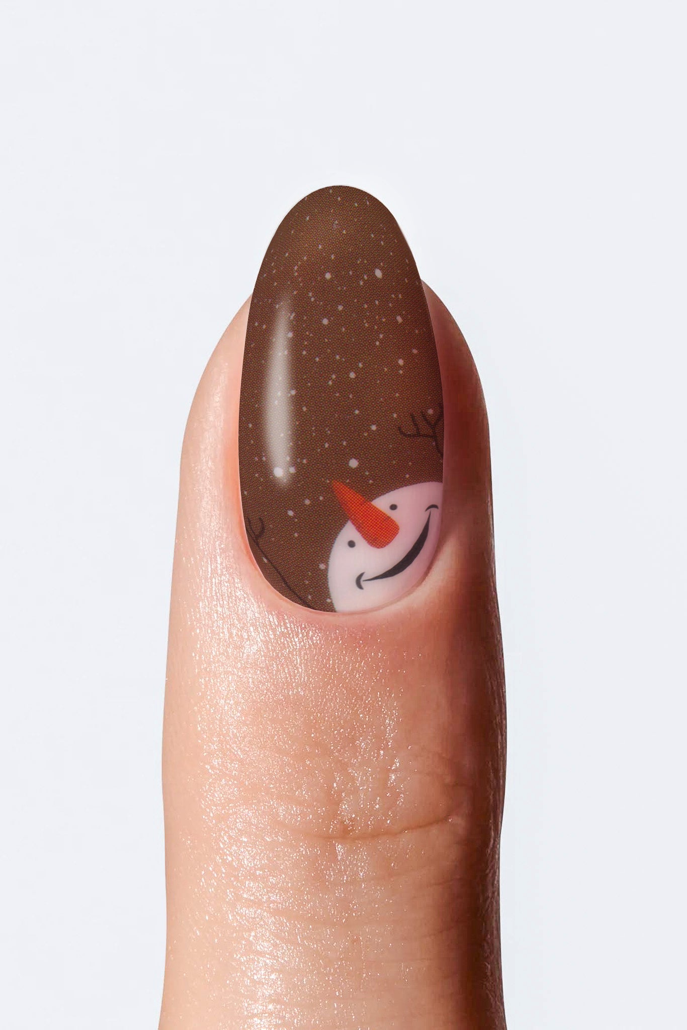 Brown nail wrap with snowman face accent design
