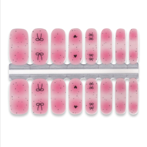 Set of pink nail wraps with designs on a white background
