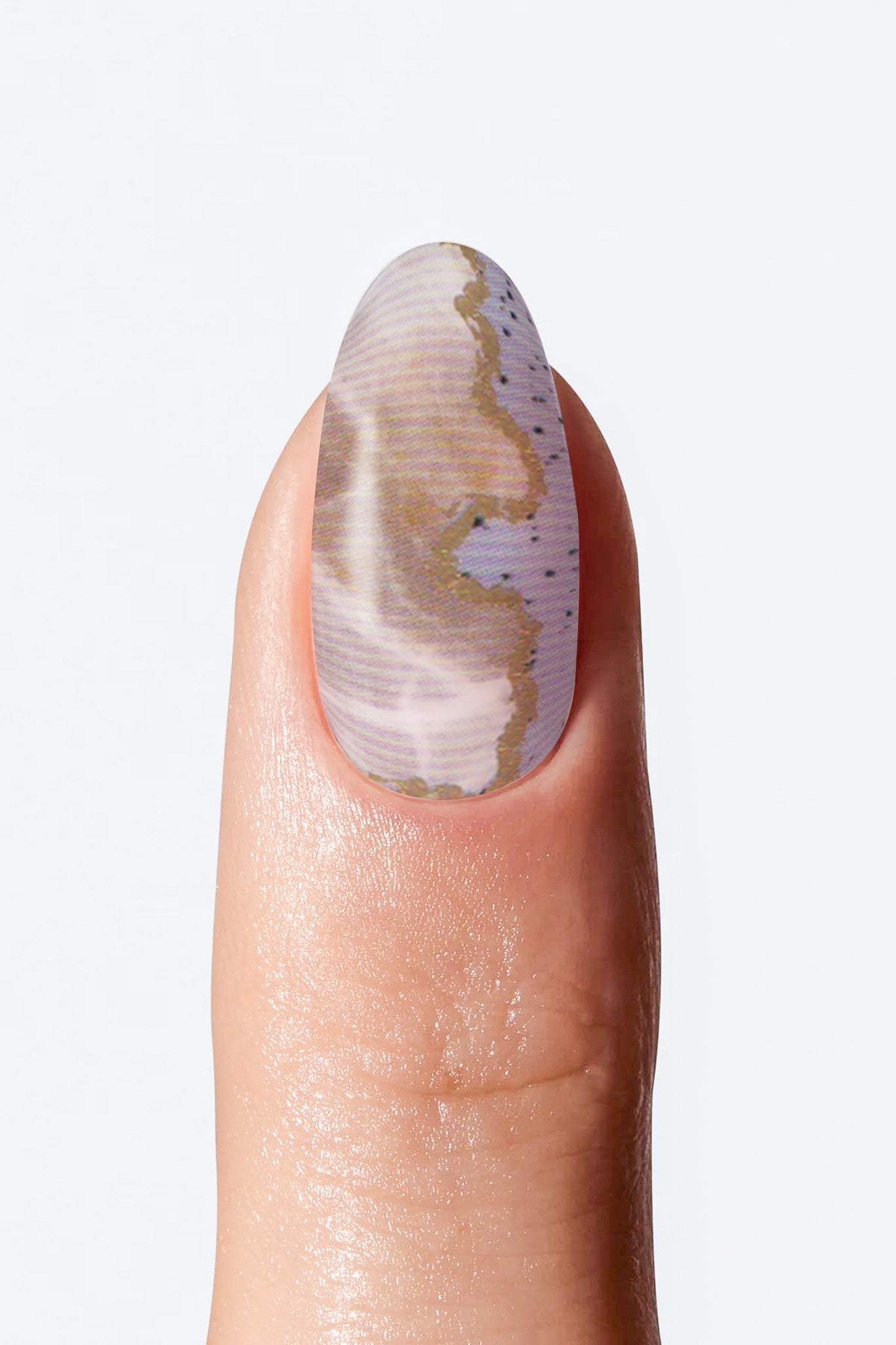 Finger with a nail featuring a marbled pattern on a white background