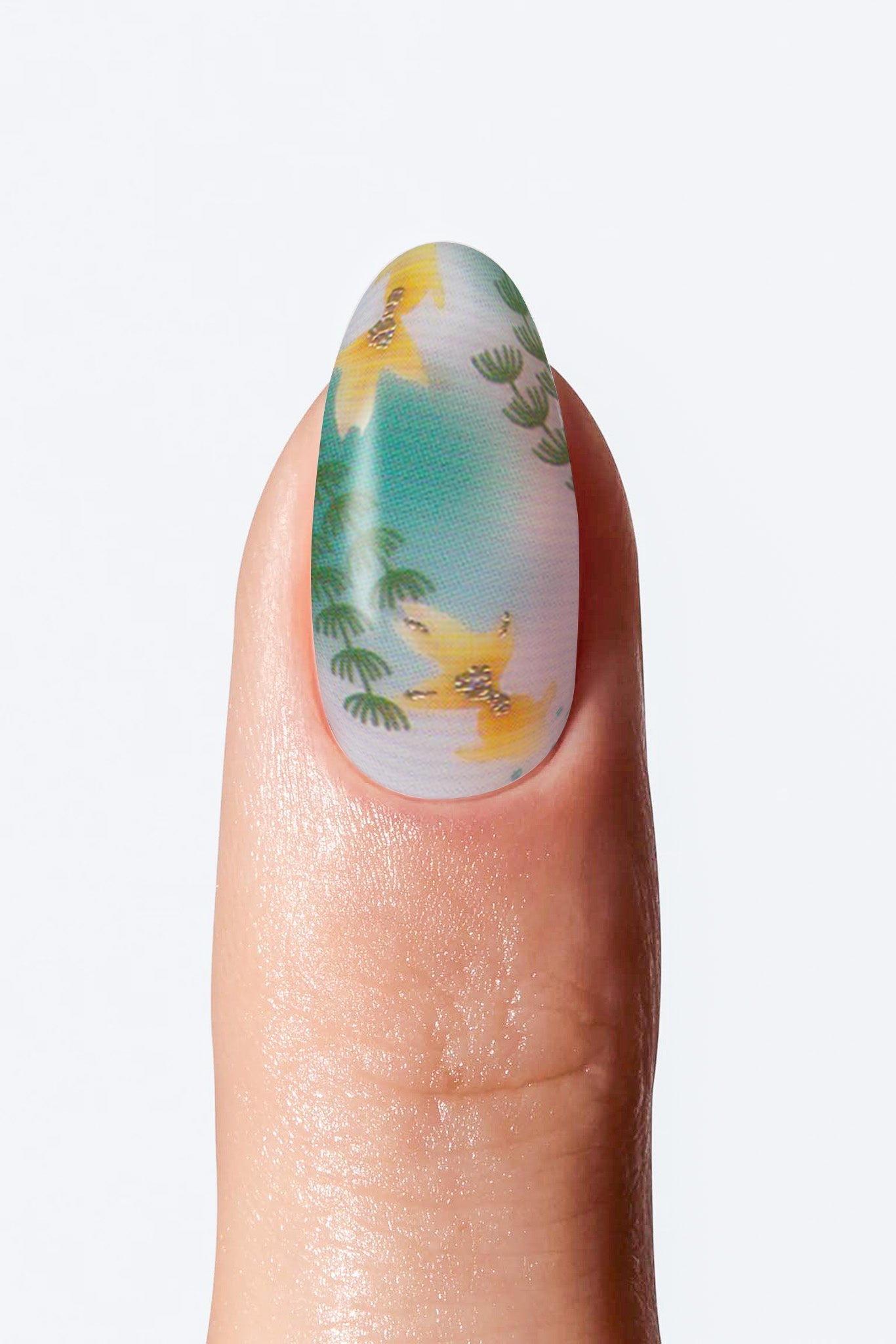 Nail with tropical design featuring green leaves and yellow flowers on a white background 
