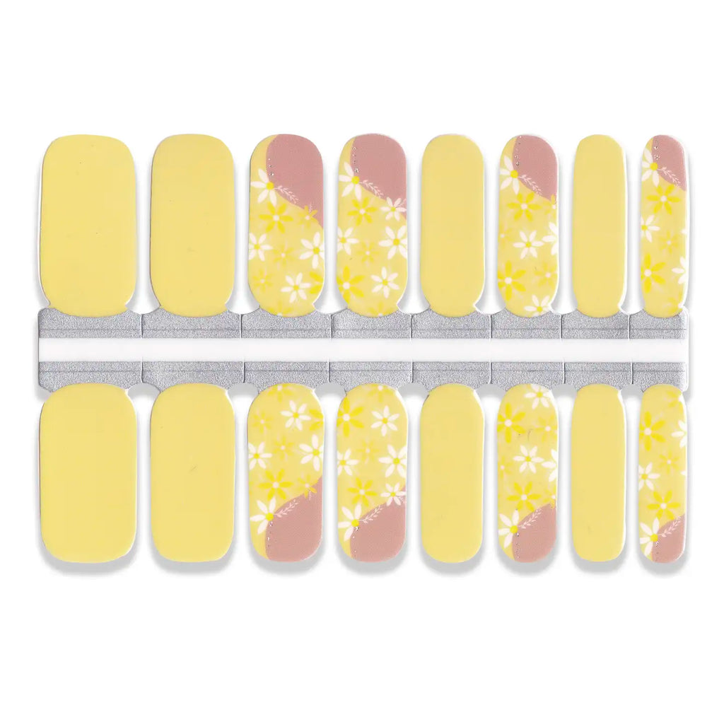 Yellow nail wrap stickers with white floral print and nude accent design in multiple sizes.”