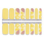 Yellow nail wrap stickers with white floral print and nude accent design in multiple sizes.”