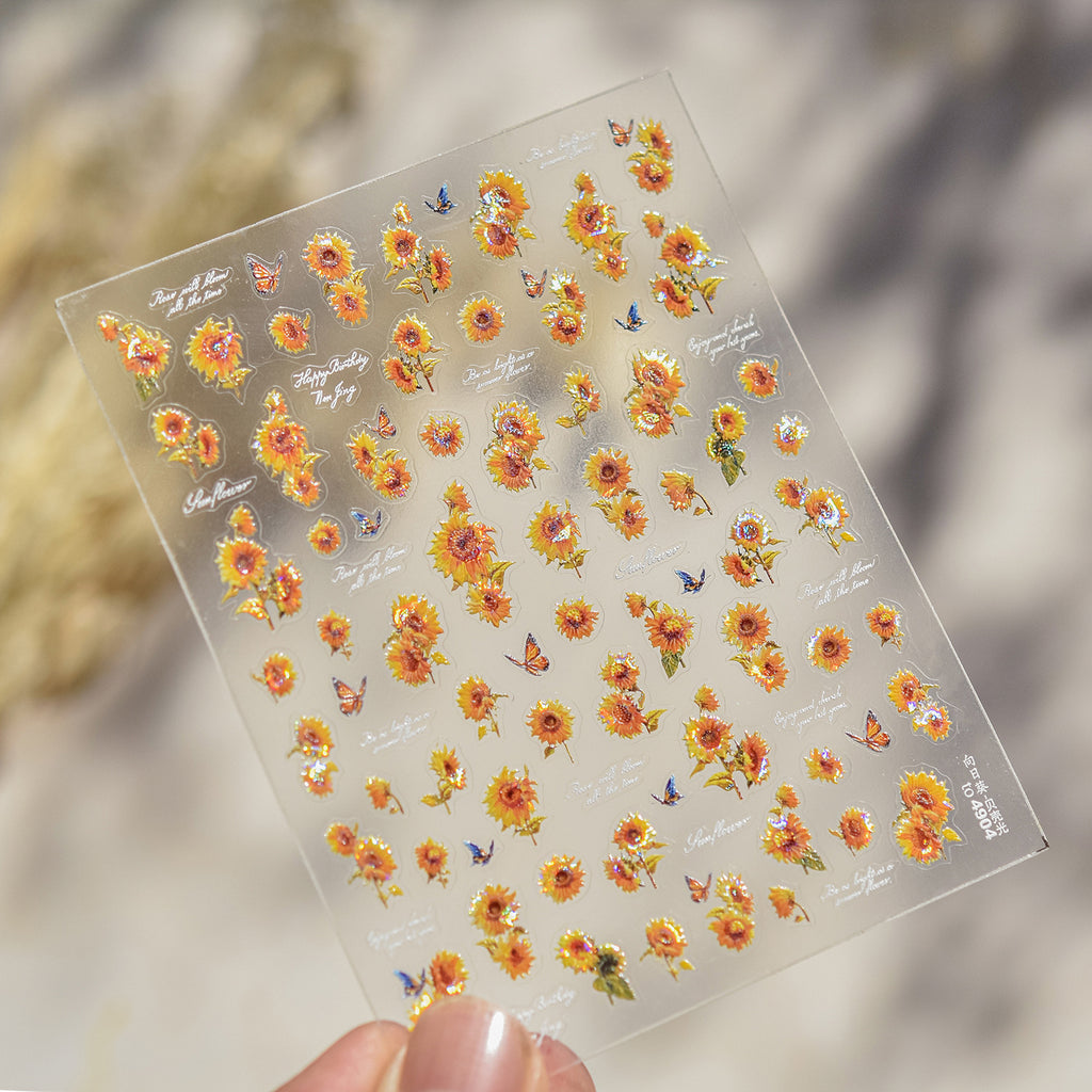 Sheet of floral stickers with sunflowers and butterflies on a clear background