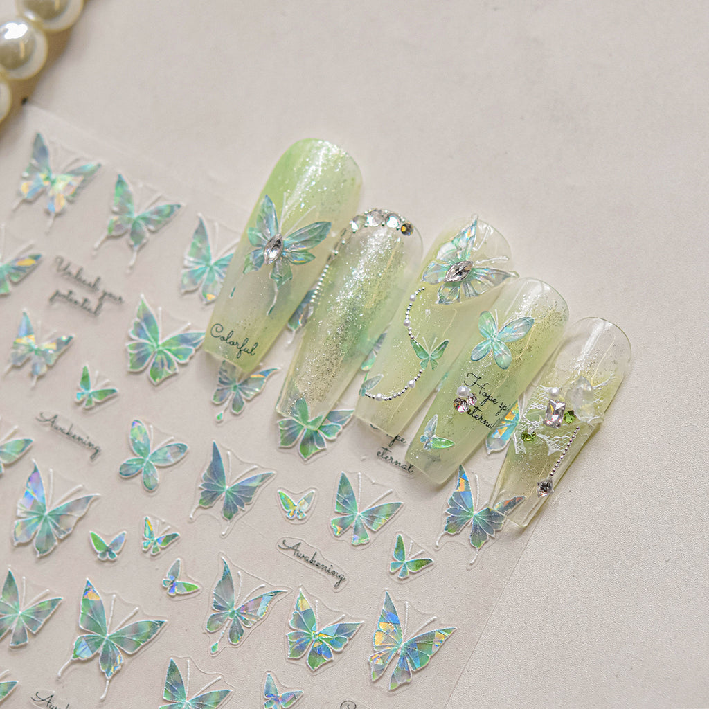Butterfly nail art stickers on a light surface