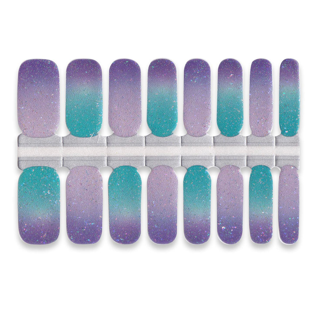 Purple and teal gradient nail wrap stickers with subtle glitter shimmer in multiple sizes.
