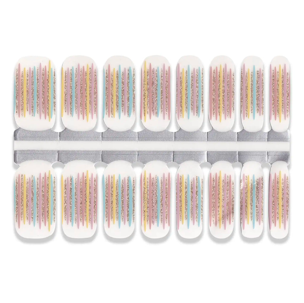White nail wrap stickers with vertical pastel stripes and gold shimmer detailing in multiple sizes.