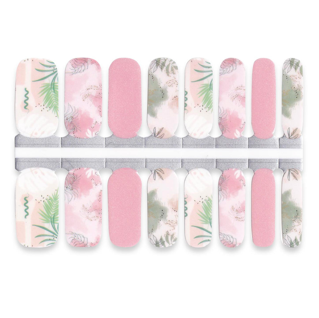 Decorative nails wrap with pink tones and leafy patterns.