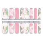 Decorative nails wrap with pink tones and leafy patterns.
